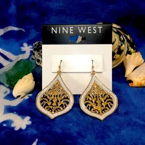Nine West 1 1/2in. Gold tone w/ silver glittery detail dangle earrings